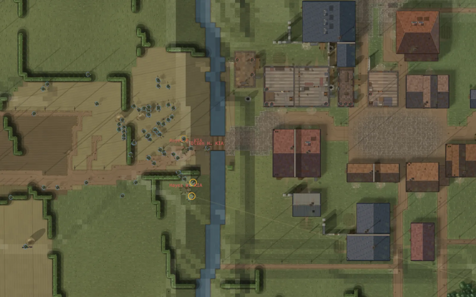 Close Combat-like, seen from above: a rifle company gathers at a bridge over a small river, with a Normandy village on the far bank.